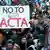 Bayern/ Ein Demonstrant haelt am Samstag (11.02.12) waehrend einer Demonstration gegen das geplante Anti-Produktpiraterie-Abkommen ACTA in der Innenstadt von Muenchen ein Plakat mit der Aufschrift "No to ACTA". Nach Polizeiangaben nahmen in Muenchen rund 16.000 Demonstranten teil. Das Abkommen, das zwischen der EU, den USA und neun weiteren Laendern das Vorgehen gegen Produktpiraterie vereinheitlichen soll, gefaehrdet aus Sicht der Kritiker den Datenschutz. Deutschland will den Vertrag vorerst nicht unterzeichnen. (zu dapd-Text) Foto: Lukas Barth/dapd