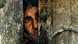 An elderly Afghan woman peeks through a door to watch as Khalil, a 25-year-old Afghan opium dealer, and visitors walk through the small alleyways of Kandahar, Afghanistan, Tuesday Dec. 18, 2001. Opium in Kandahar sells for US$500.00 per kilo (US$250 per pound), and seven kilos are needed to process one kilo of heroin. Opium sales never stopped during the Taliban regime, said Khalil. (AP Photo/Jerome Delay) An elderly Afghan woman peeks through a door to watch as Khalil, a 25-year-old Afghan opium dealer, and visitors walk through the small alleyways of Kandahar, Afghanistan, Tuesday Dec. 18, 2001. Opium in Kandahar sells for US$500.00 per kilo (US$250 per pound), and seven kilos are needed to process one kilo of heroin. Opium sales never stopped during the Taliban regime, said Khalil. (AP Photo/Jerome Delay)