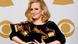Adele poses backstage with her six awards at the 54th annual Grammy Awards Adele poses backstage with her six awards at the 54th annual Grammy Awards