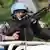 A UN peacekeeper in a blue helment behind a machine gun on patrol Photo: ddp images/AP Photo/Sunday