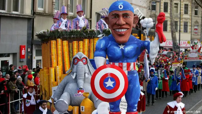 A caricature of US President Barack Obama as captain America appears on a Rose Monday parade float.
Photo: Rolf Vennenbernd dpa/lnw +++(c) dpa - Bildfunk+++