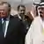 King Abdullah bin Abdul Aziz al-Saud of Saudi Arabia, right walks with Iraqi President Jalal Talabani
