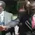 Zimbabwe President Robert Mugabe, left, talks to Morgan Tsvangirai, Zimbabwe Prime Minster after the swearing in ceremony of new ministers at State House in Harare, Thursday, June, 24, 2010. (ddp images/AP Photo/Tsvangirayi Mukwazhi)