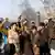 Afghan men shout anti-US slogans during a demonstration in Jalalabad province