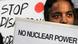 A woman living near Kudankulam atomic plant holds a placard as she participates in an anti-nuclear protest in New Delhi, India, Thursday, Dec. 8, 2011. The protesters demanded scrapping of projects that endanger people's safety and threaten livelihoods, according to a press release. (AP Photo/ Manish Swarup) A woman living near Kudankulam atomic plant holds a placard as she participates in an anti-nuclear protest in New Delhi, India, Thursday, Dec. 8, 2011. The protesters demanded scrapping of projects that endanger people's safety and threaten livelihoods, according to a press release. (AP Photo/ Manish Swarup)