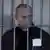 Screenshot aus einem Parodie-Video, das Wladimir Putin hinter Gittern zeigt (Foto: youtube)