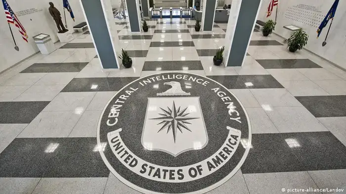 Image #: 11984570 The old entrance of the Central Intelligence Agency Headquarters displaying the seal of the CIA on the floor, September 21, 2010. In the background (right) is the Memorial Wall which currently has 102 stars engraved for each member of the agency that gave of his/her life in the line of duty. Names of those are listed in the book below, with a 37 not being listed and will remain Secret for the nature of the work they were doing. Greg E. Mathieson Sr./MAI /Landov