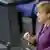 Chancellor Angela Merkel addressing the Bundestag