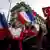 Franco-Turkish demonstrators wave French and Turkish flags as they protest against the law