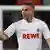 Lukas Podolski ballt die Faust. Foto: dapd