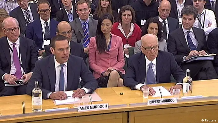 News International Chairman James Murdoch (front L), and his father Rupert Murdoch, are seen appearing before parliamentarian in London in this July 19, 2011 file photograph. James Murdoch, the younger son of chairman Rupert, would relinquish his position as executive chairman of its News International unit, News Corp said on February 29, 2012. REUTERS/Parbul TV via Reuters TV/Files (BRITAIN - Tags: MEDIA BUSINESS POLITICS) FOR EDITORIAL USE ONLY. NOT FOR SALE FOR MARKETING OR ADVERTISING CAMPAIGNS