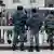 Russian police officers patrol in Manezh Square in downtown Moscow, Russia, Saturday, March 3, 2012.