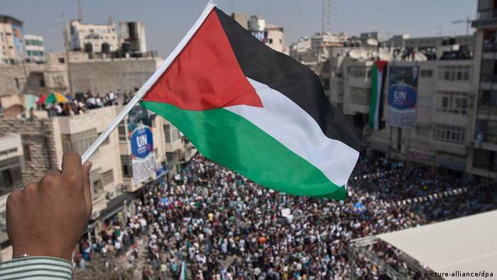 Palestinians take part in a rally in the West Bank town of Ramallah supporting Palestinian statehood