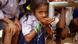School girl in India drinks water from a new handpump School girl in India drinks water from a new handpump