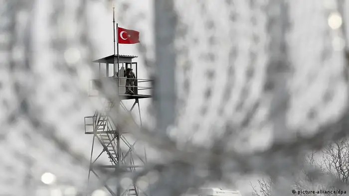 epa03094556 An underconstruction watchtower is shown at a portion of a state-of-the-art security fence along a 12.5-kilometre stretch of the land border with Turkey, in Nea Vyssa city, Evros, Greece, 06 February 2012. The specific 'bulge' of land extends west of the Evros (Maritsa) River and across from the Turkish border city of Edirne (ancient Andrianople), whereas most of the Greek-Turkish border in the northeast Thrace province is delineated by the Evros River. The project is budgeted at 3.16 million euros and is due for completion in late August or early September 2012. Greece's only land border with Turkey has increasingly been targetted by migrant-smugglers over the past few years as an easier 'route' to ferry mostly third world migrants from non-EU member Turkey into Greece, in a bid to eventually reach western Europe and Britain. In 2011 alone, 54,974 non-legal immigrants clandestinely crossed the Evros border into Greece. EPA/NIKOS ARVANITIDIS