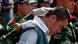 A Chinese paramilitary officer keeps the head of a drug dealer bowed during a public sentencing to mark International Day against Drug Abuse and Illicit Drug Trafficking in Hangzhou, eastern China's Zhejiang province, Monday, June 26, 2006. Chinese drug control officials said Thursday their yearlong war on drugs has severely squeezed heroin supplies from the Golden Triangle. Officials also announced the arrest of some 46,000 drug suspects and the seizure of some 6.9 tons of heroin last year. During the trial in Hangzhou, 20 drug dealers were sentenced today with three given the death penalty and executed soon after. (AP Photo) ** CHINA OUT ** A Chinese paramilitary officer keeps the head of a drug dealer bowed during a public sentencing to mark International Day against Drug Abuse and Illicit Drug Trafficking in Hangzhou, eastern China's Zhejiang province, Monday, June 26, 2006. Chinese drug control officials said Thursday their yearlong war on drugs has severely squeezed heroin supplies from the Golden Triangle. Officials also announced the arrest of some 46,000 drug suspects and the seizure of some 6.9 tons of heroin last year. During the trial in Hangzhou, 20 drug dealers were sentenced today with three given the death penalty and executed soon after. (AP Photo) ** CHINA OUT **