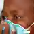 Südafrika Tuberkulose Frau mit Mundschutz