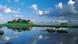Pictured here is the Halligen Island of Hooge on the Wadden Sea. This vast, flat landscape covers over 10,000 square kilometers between islands, including the Halligens, and the North Sea coast. The view changes daily – sometimes even hourly, as twice a day, the water rises by two and a half to three meters. Only then do ships travel between the coast and the islands - which is good to know when planning a journey. But it's at low tide that the real Wadden Sea adventure begins: cross the flats by coach, or just take off your shoes and wade barefoot through the mud. But only with a qualified guide! Pictured here is the Halligen Island of Hooge on the Wadden Sea. This vast, flat landscape covers over 10,000 square kilometers between islands, including the Halligens, and the North Sea coast. The view changes daily – sometimes even hourly, as twice a day, the water rises by two and a half to three meters. Only then do ships travel between the coast and the islands - which is good to know when planning a journey. But it's at low tide that the real Wadden Sea adventure begins: cross the flats by coach, or just take off your shoes and wade barefoot through the mud. But only with a qualified guide!