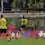 Shinji Kagawa jumps to head a ball at goal