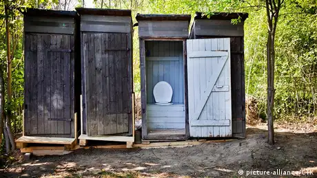 A row of pit latrines (Photo: Rene Fluger)