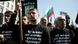 Members of of nationalist party "Ataka" wear T-shirst with the words "I don't want to live in a Gypsy country" during a protest in front Bulgarian Presidency building, Sofia, Saturday, Oct. 1, 2011. The Bulgarian President Georgi Parvanov's says the National Security Council is holding an emergency meeting to discuss rising ethnic tensions as nationalist groups stage anti-Roma rallies across the country. (ddp images/AP Photo/Valentina Petrova) Members of of nationalist party "Ataka" wear T-shirst with the words "I don't want to live in a Gypsy country" during a protest in front Bulgarian Presidency building, Sofia, Saturday, Oct. 1, 2011. The Bulgarian President Georgi Parvanov's says the National Security Council is holding an emergency meeting to discuss rising ethnic tensions as nationalist groups stage anti-Roma rallies across the country. (ddp images/AP Photo/Valentina Petrova)