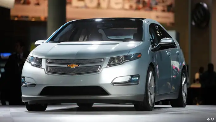 FILE - In this file photograph taken Dec. 2, 2009, the 2011 Chevrolet Volt debuts at the Los Angeles Auto Show, in Los Angeles. General Motors will strengthen the structure around the batteries in its Volt electric cars to keep them safe during crashes, a person briefed on the matter said Thursday. Jan. 5, 2011. (AP Photo/Jae C. Hong, File)