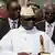 Yahya Jammeh surrounded by his aides