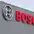 Das Logo und der Schriftzug "Bosch" sind an der Fassade der Robert Bosch Fahrzeugelektrik Eisenach GmbH in Eisenach zu sehen, aufgenommen am Montag (07.11.2011). (Foto: Martin Schutt)