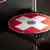 Компакт-диск с наклейкой в виде швейцарского флага