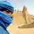 A Tuareg nomad stands near a 13th century mosque in Timbuktu.