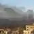 This image made from amateur video and released by Shaam News Network Wednesday, April 4, 2012, purports to show black smoke from shelling billowing into the sky air in Aleppo, Syria. Syrian troops launched a fierce assault on a Damascus suburb Thursday, days ahead of a deadline for a U.N.-brokered cease-fire, with activists describing it as one of the most violent attacks around the capital since the year-old uprising began. (Foto:Shaam News Network via APTN/AP/dapd) THE ASSOCIATED PRESS CANNOT INDEPENDENTLY VERIFY THE CONTENT, DATE, LOCATION OR AUTHENTICITY OF THIS MATERIAL. TV OUT