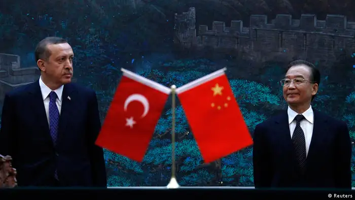 Source News Feed: EMEA Picture Service, Germany Picture Service Turkey's Prime Minister Recep Tayyip Erdogan (L) and Chinese Premier Wen Jiabao attend a signing ceremony at the Great Hall of the People in Beijing April 9, 2012. REUTERS/David Gray (CHINA - Tags: POLITICS)