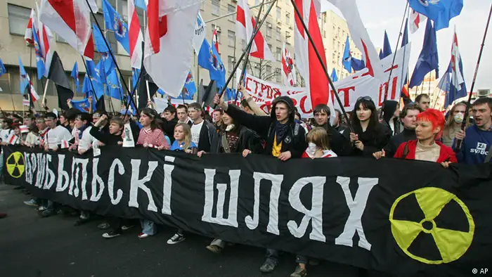 Members of the opposition Young Front march to commemorate Chernobyl nuclear disaster victims in Minsk, Thursday, April 26, 2007. The banner reads: ''Chernobyl's Way,'' indicating the name of the annual march. About 5,000 people gathered Thursday in the capital of Belarus, where large swathes of territory were irradiated by 1986 the Chernobyl nuclear reactor explosion, then marched through the city to mark the anniversary. Demonstrators demanded greater financial support for victims of the disaster as well democratic reforms from the Belarusian government. (ddp images/AP Photo/Sergei Grits)
