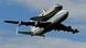 The Discovery space shuttle, mated with a Boeing 747 carrier aircraft, flies over before landing at the Washington Dulles International Airport in Chantilly, Virginia, USA, 17 April 2012. The Discovery space shuttle, mated with a Boeing 747 carrier aircraft, flies over before landing at the Washington Dulles International Airport in Chantilly, Virginia, USA, 17 April 2012.