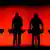 Kraftwerk on stage in front of a red background Copyright: Peter Steffen/dpa