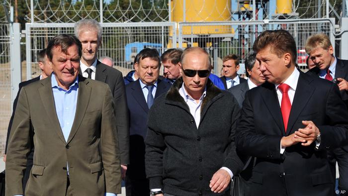 Gerhard Schroeder with Vladimir Putin and Alexey Miller at the Portovaya compressor station on September 6, 2011 