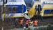 epa03191660 Rescue workers evacuate injured passengers at the scene of a train collision near Amterdam, The Netherlands, 21 April 2012. At least 48 people were reported injured, part of them seriously, when two train collided between train stations Amsterdam-Sloterdijk and Amsterdam-Centraal in Amsterdam. EPA/EVERT ELZINGA epa03191660 Rescue workers evacuate injured passengers at the scene of a train collision near Amterdam, The Netherlands, 21 April 2012. At least 48 people were reported injured, part of them seriously, when two train collided between train stations Amsterdam-Sloterdijk and Amsterdam-Centraal in Amsterdam. EPA/EVERT ELZINGA