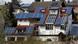 Mit Solarzellen bestückte Wohnhäuser, aufgenommen in Holzkirchen (Unterfranken) Foto: Karl-Josef Hildenbrand dpa/lby Mit Solarzellen bestückte Wohnhäuser, aufgenommen in Holzkirchen (Unterfranken) Foto: Karl-Josef Hildenbrand dpa/lby
