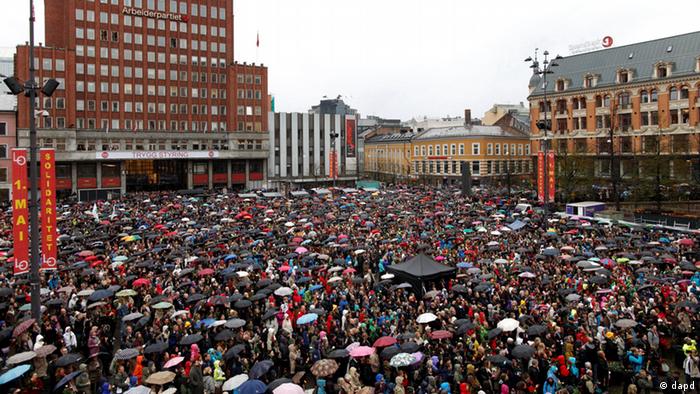 Some 40,000 people stand in drizzling rain in Youngstorget square, Oslo