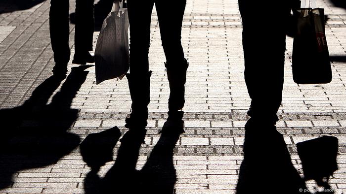 Pedestrians with bags 