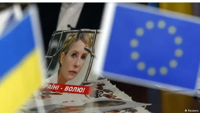 A picture of Ukraine's jailed former Prime Minister Yulia Tymoshenko is seen on a table during an interview with her husband Oleksander for Reuters TV in Prague April 27, 2012. REUTERS/Petr Josek (CZECH REPUBLIC - Tags: POLITICS) /Linnenbrink