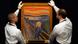 Sotheby's employees pose for a photograph with Edvard Munch's painting "The scream" Sotheby's employees pose for a photograph with Edvard Munch's painting "The scream"