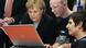 German Chancellor Angela Merkel looking at a laptop computer (Photo: Fabian Bimmer) German Chancellor Angela Merkel looking at a laptop computer (Photo: Fabian Bimmer)