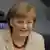 Berlin/ Bundeskanzlerin Angela Merkel (CDU) laechelt am Donnerstag (10.05.12) im Bundestag in Berlin. Merkel auesserte sich in einer Regierungserklaerung zum G8-Gipfel und Nato-Gipfel. (zu dapd-Text) Foto: Michael Gottschalk/dapd