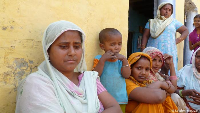 Suneeta and other manual scavenger women at a house in Mudali village, northern India