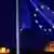 The European Union flag flutters in the wind with the ancient Parthenon temple, right, and the Propylaea, left, at the Acropolis Hill, in Athens on Tuesday, Oct. 25, 2011. Prime Minister George Papandreou called for unity across Greece's political spectrum Tuesday, as European officials struggled to come up with a definitive solution to Greece's debt woes and prevent it from dragging down other EU nations.(ddp images/AP Photo/Petros Giannakouris)