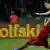 Borussia Dortmund's Robert Lewandowski (R) scores against Bayern Munich