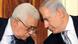 Mahmoud Abbas and Benjamin Netanyahu lean in and confer during a discussion. Mahmoud Abbas and Benjamin Netanyahu lean in and confer during a discussion.