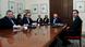 Greek political leaders sitting at a table ahead of their meeting Greek political leaders sitting at a table ahead of their meeting