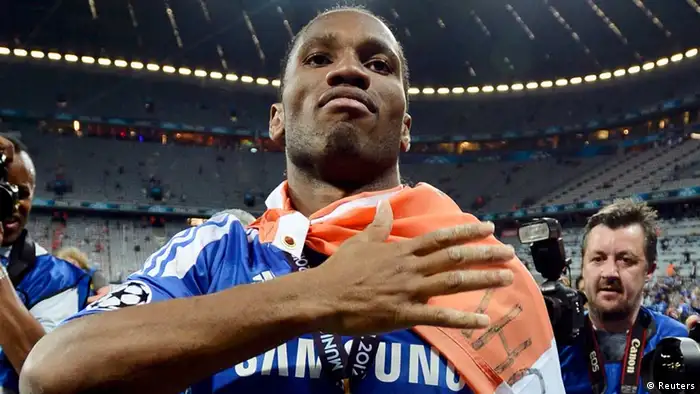 Didier Drogba of Chelsea celebrate after his team's Champions League final soccer match against Bayern Munich at the Allianz Arena in Munich, May 19, 2012. REUTERS/Dylan Martinez (GERMANY - Tags: SPORT SOCCER)